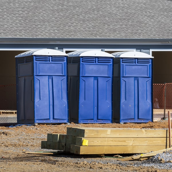 what is the cost difference between standard and deluxe porta potty rentals in Mandaree ND